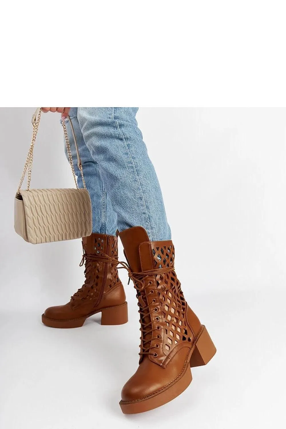 Brown lacy ankle boots with a heel