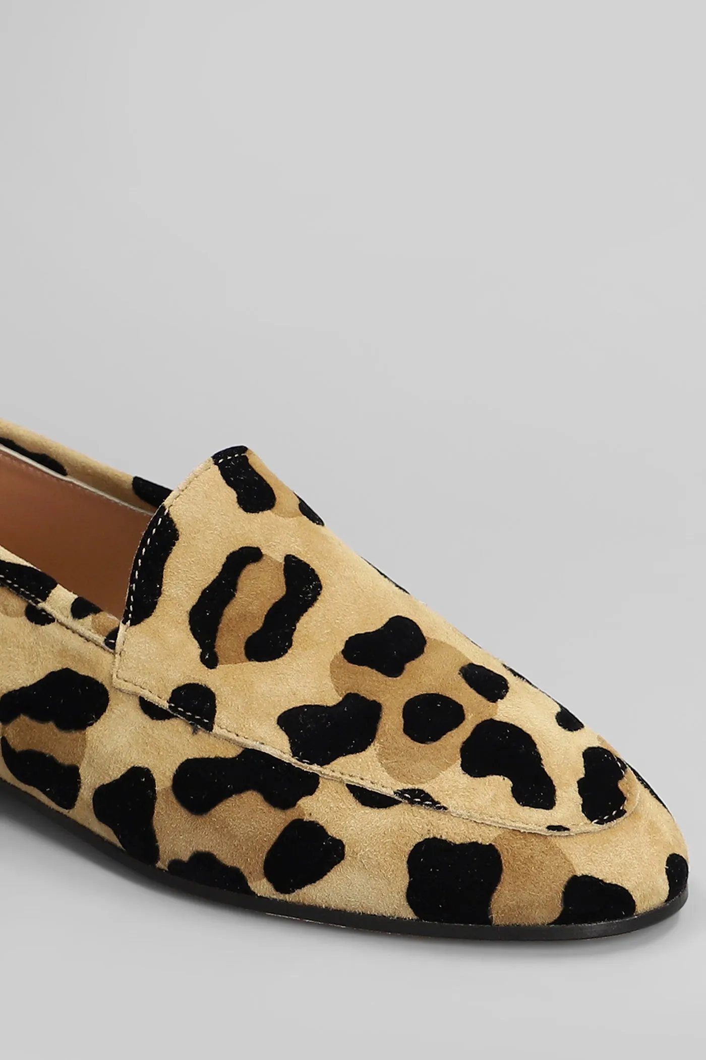 Loafers in Animalier suede