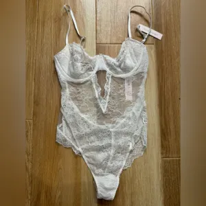 Victoria’s Secret lingerie white lace thong bodysuit